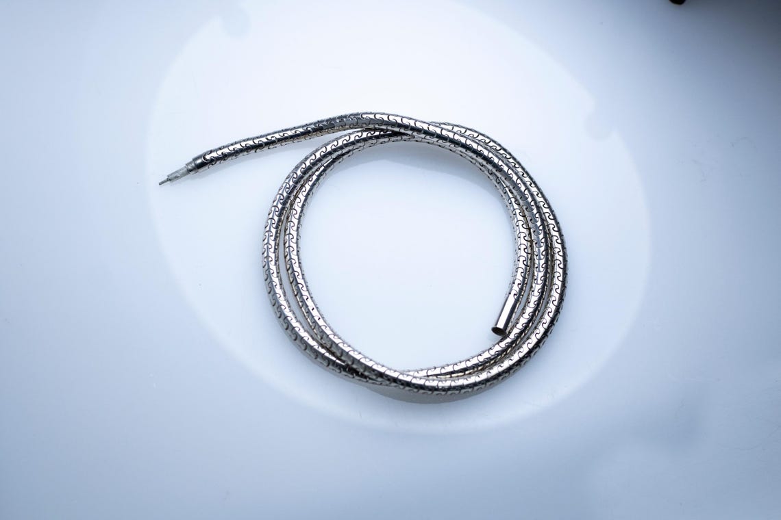 Durable sterling silver snake chain with puzzle link design