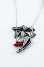 Artistic silver necklace with natural red coral