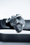 Handcrafted sterling silver bull head belt buckle on leather strap