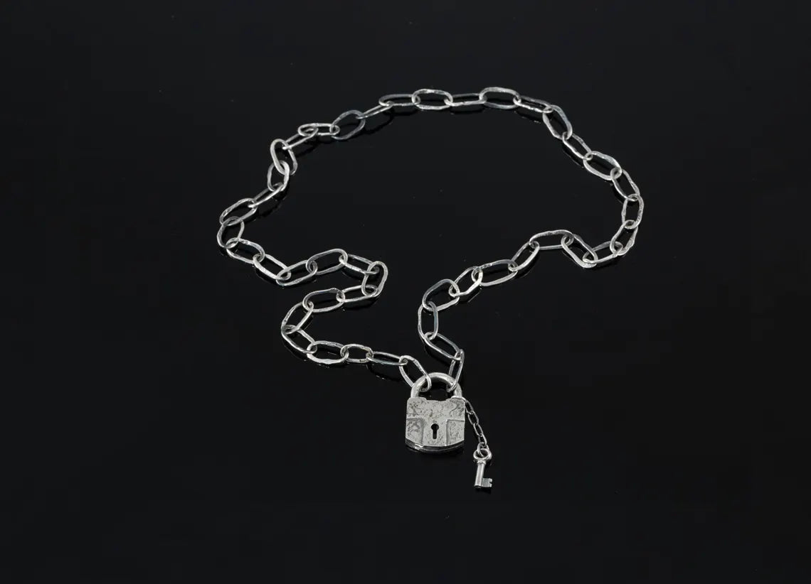 Handcrafted sterling silver padlock necklace with key charm