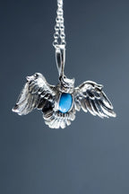 Handmade sterling silver flying owl pendant