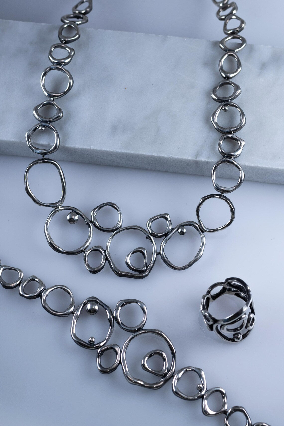 Modern sterling silver necklace bracelet and dangle earrings set