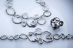 Handcrafted Air Element sterling silver jewelry set with abstract design