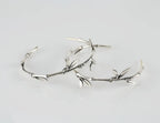 Elegant 925 silver statement hoops with leaf detailing