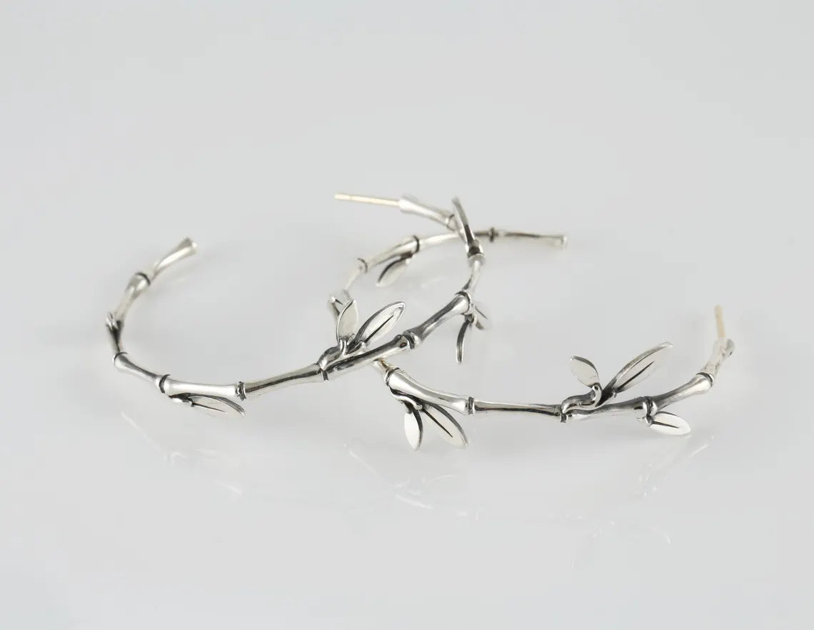 Elegant 925 silver statement hoops with leaf detailing