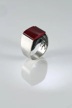 Serpent ring with blue lazulite gemstone detail