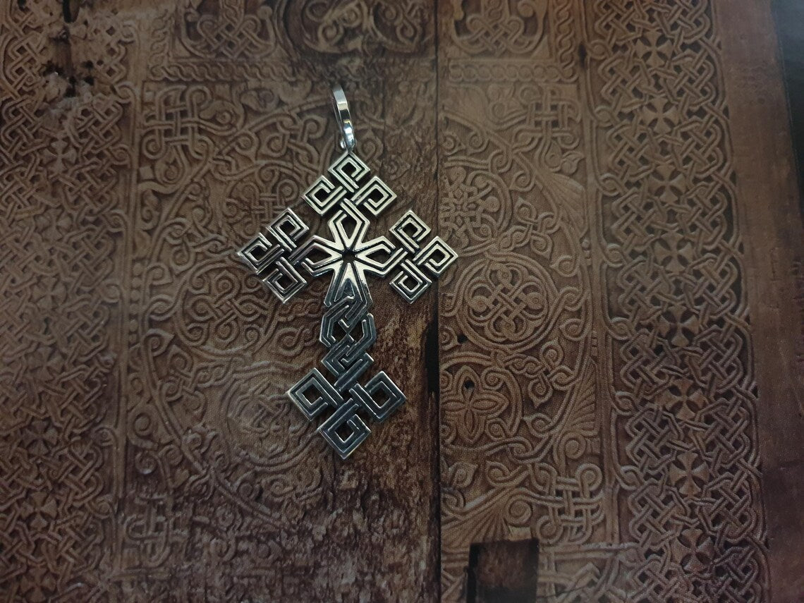 Geometric cross silver pendant