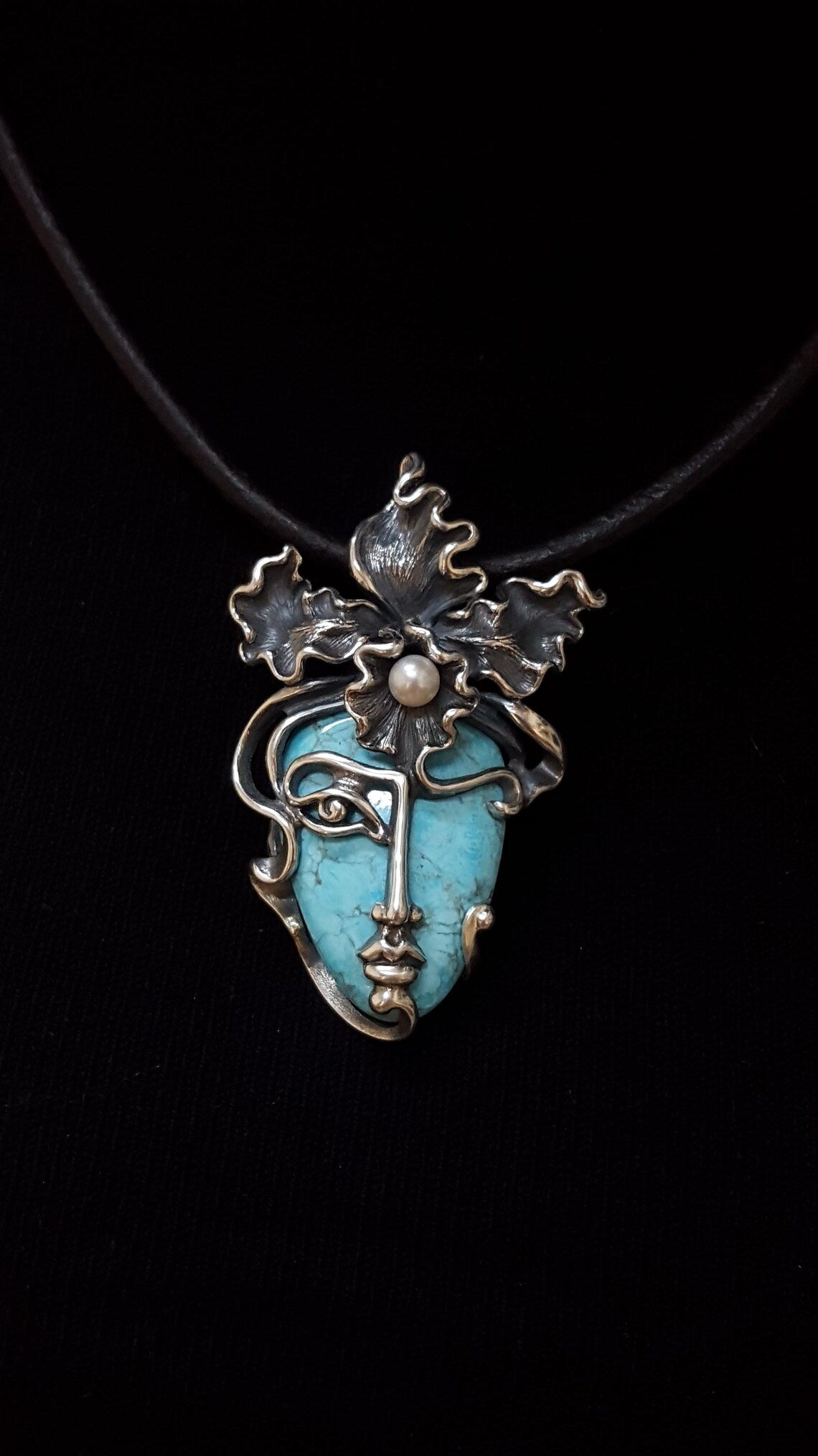 Orchid goddess pendant