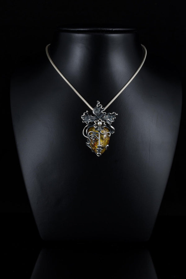 Sterling silver face necklace