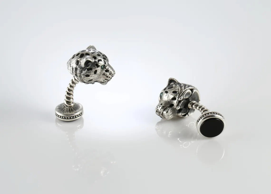 Leopard cufflinks with green enamel eyes