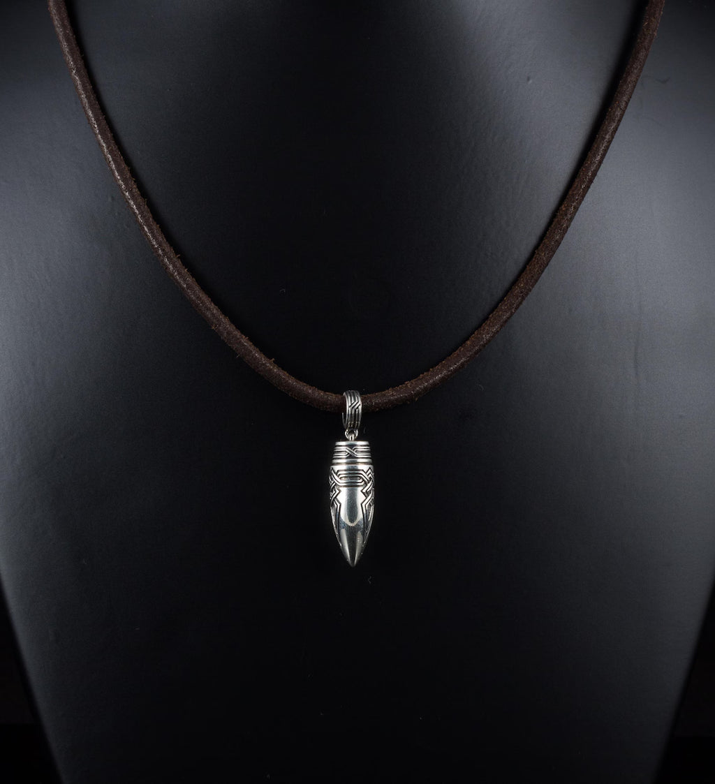 Tribal engraved bullet pendant