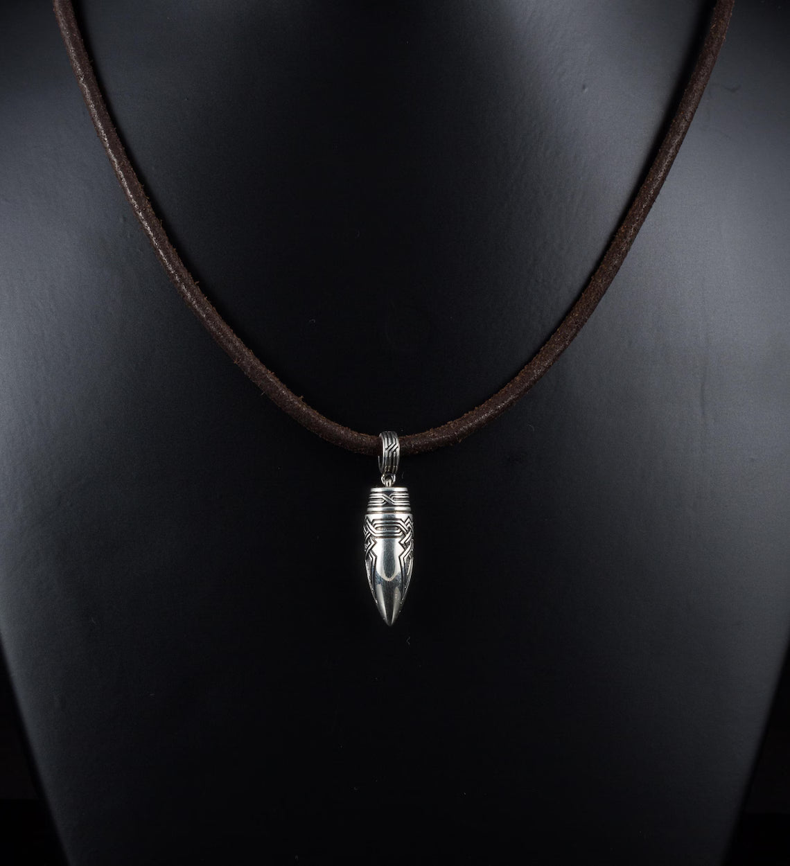 Tribal engraved bullet pendant