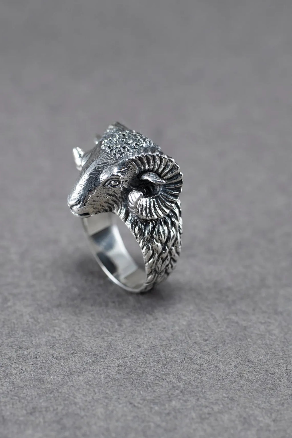 Detailed animal ring with ram design