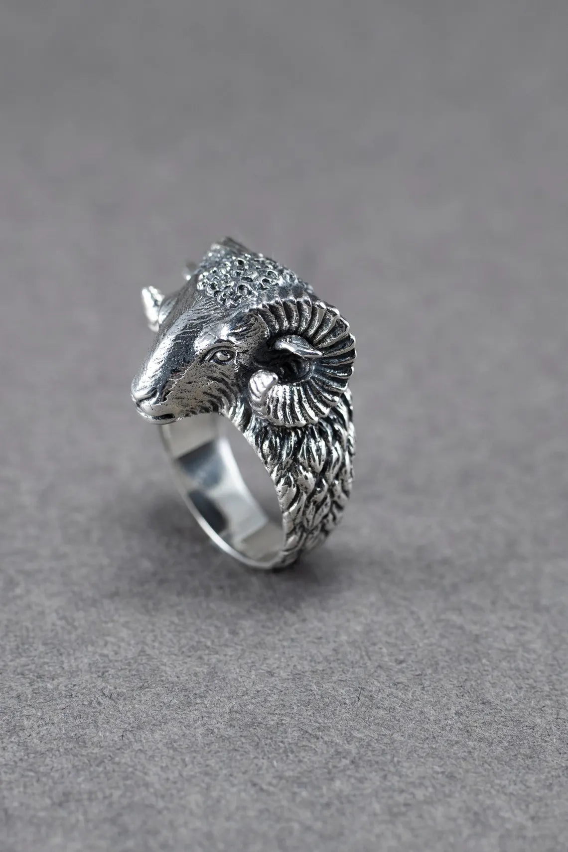 Detailed animal ring with ram design