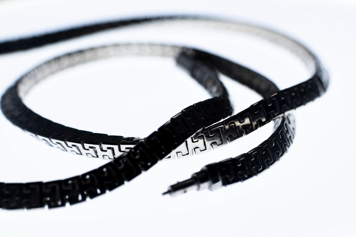 Modern geometric silver necklace with movable triangle links