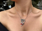 Feminine sculptural sterling silver pendant