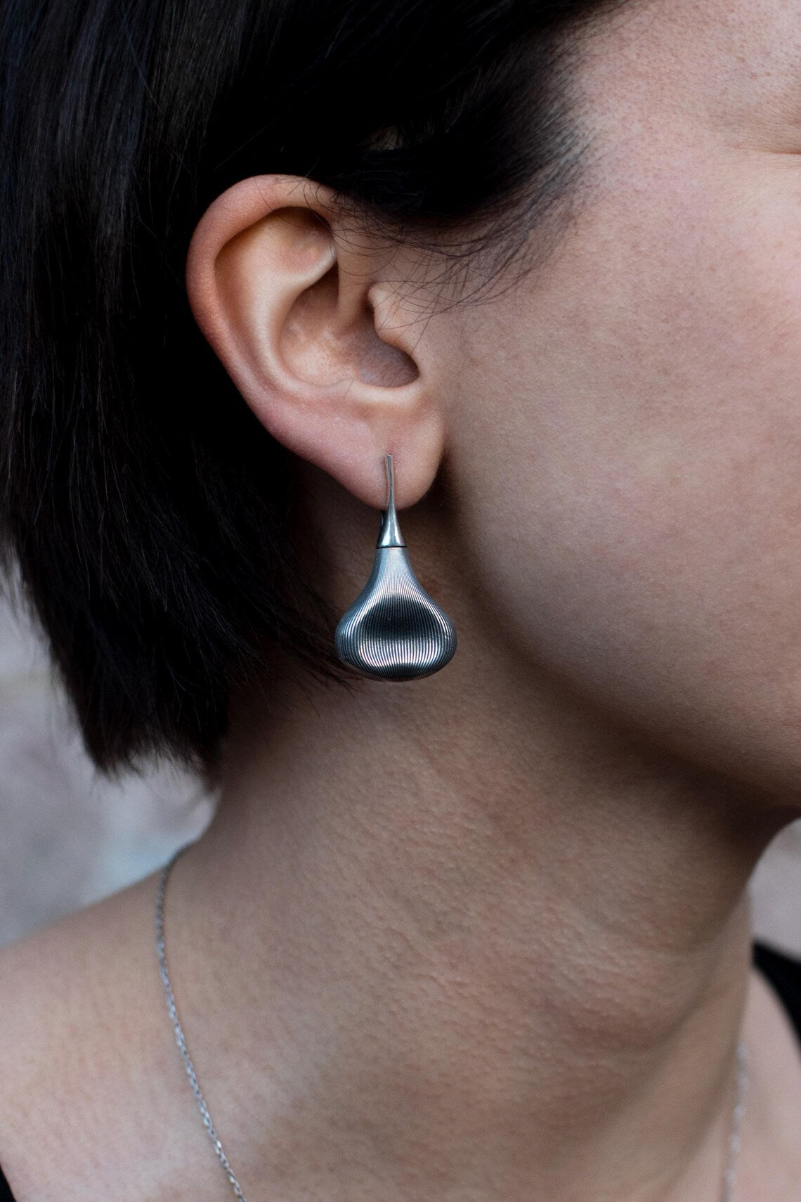Minimalist sterling silver teardrop earrings and matching bracelet set