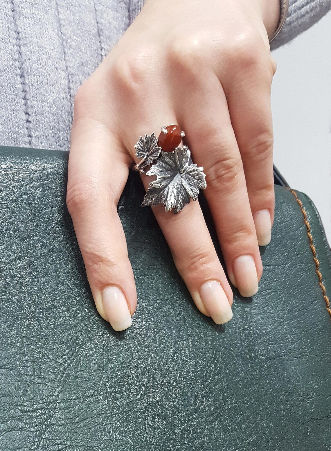 Handmade silver vine ring with red gemstone
