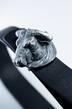 Western cowboy belt with bold silver bull design
