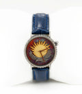 Artistic silver watch with blue leather strap and gold sun dial