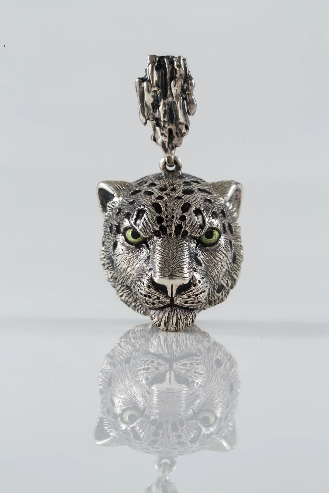 Snow leopard sterling silver pendant