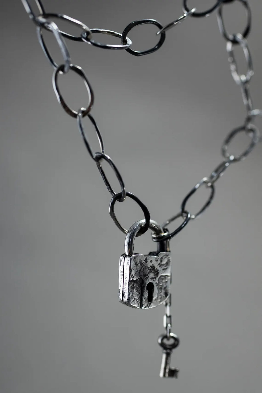 Unisex artisan silver lock necklace with vintage-inspired design