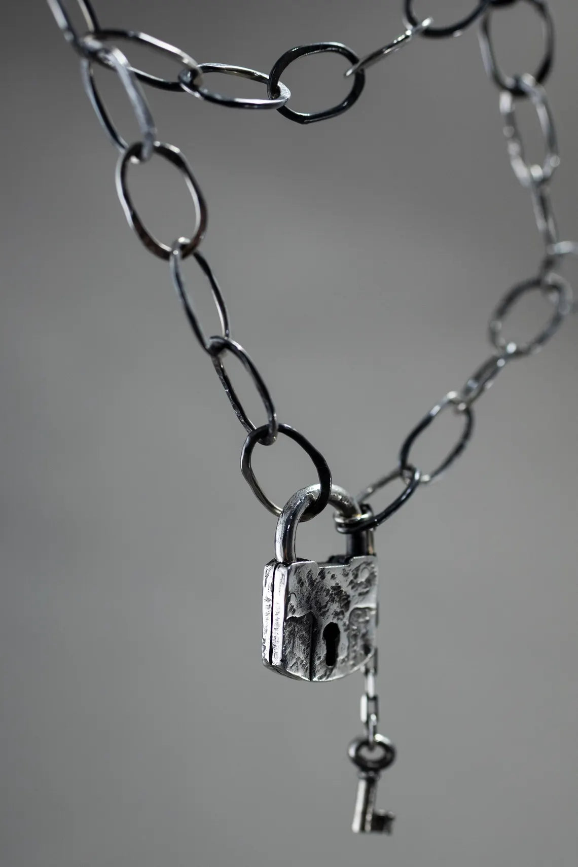 Unisex artisan silver lock necklace with vintage-inspired design
