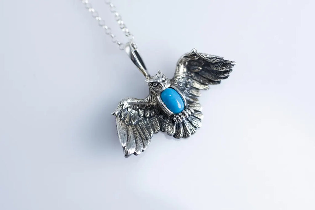 Nature inspired sterling silver bird pendant
