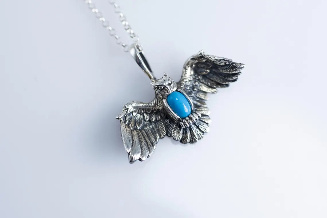 Nature inspired sterling silver bird pendant
