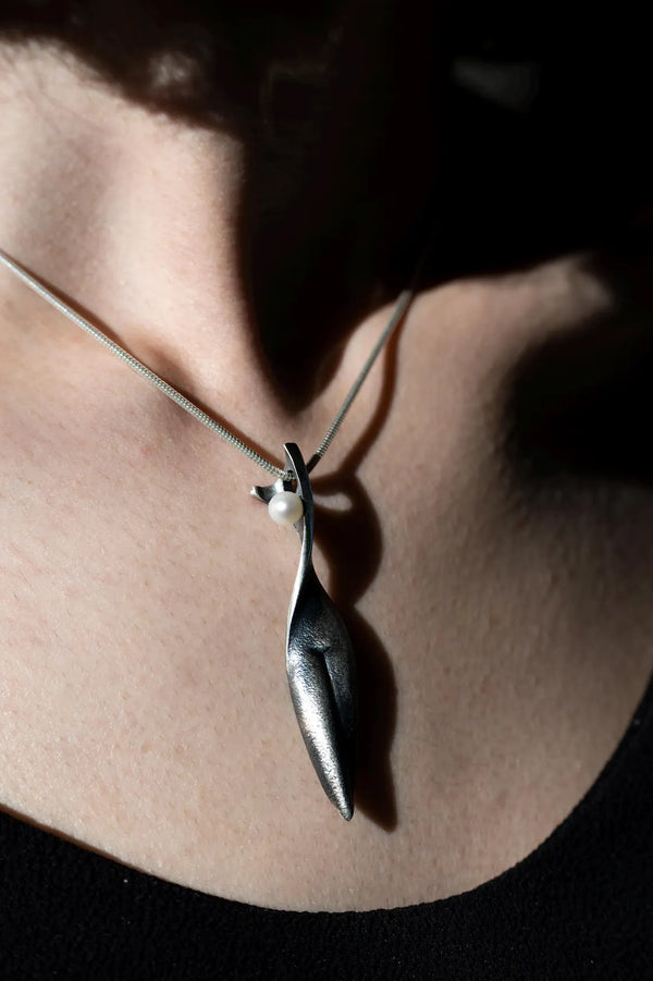 Handmade sterling silver abstract female pendant