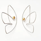 Handcrafted sterling silver abstract butterfly face earrings