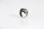 Handcrafted sterling silver snake ring with detailed reptile design