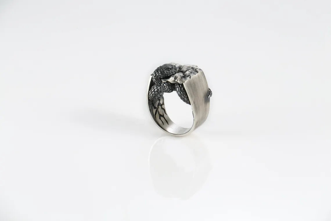 Handcrafted sterling silver snake ring with detailed reptile design