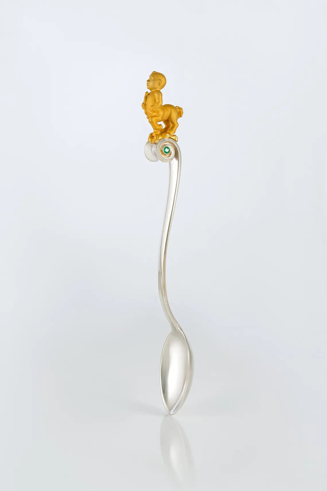 Handcrafted sterling silver Sagittarius baby spoon with emerald stone