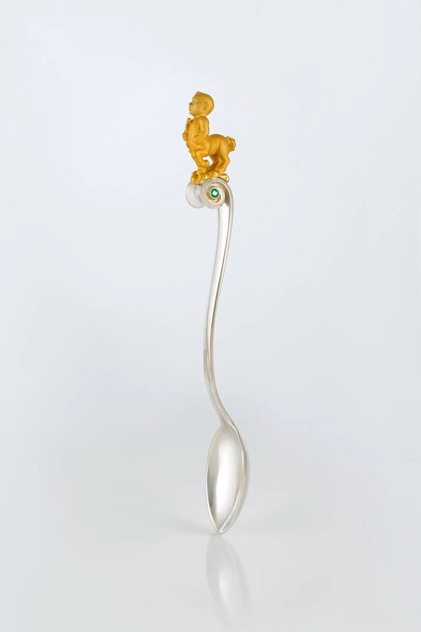 Handcrafted sterling silver Sagittarius baby spoon with emerald stone