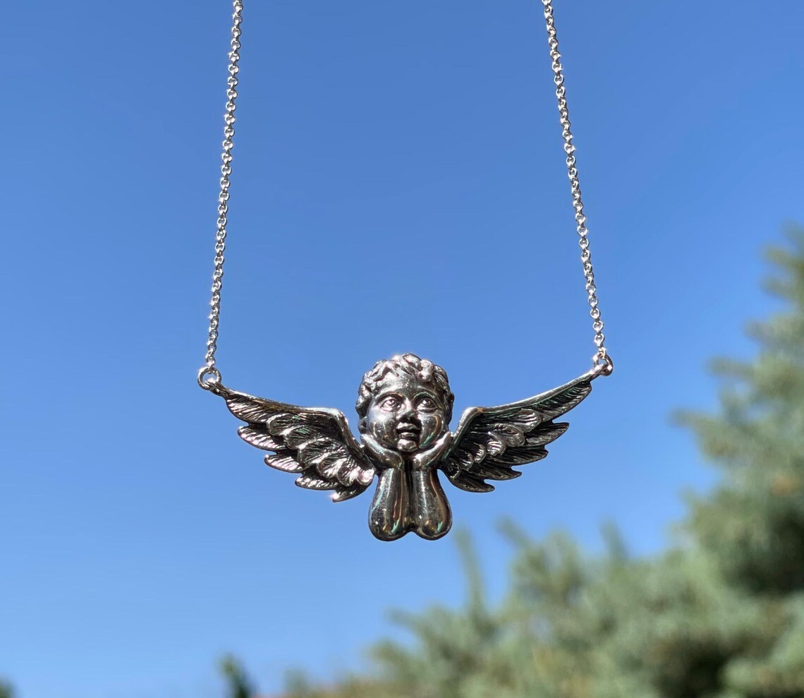 Cherub necklace in solid sterling silver
