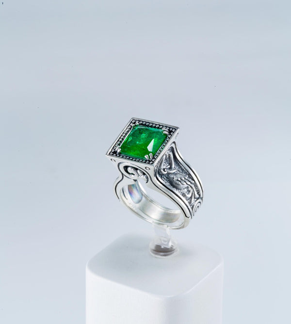 Sterling silver crane ring with lab emerald gemstone
