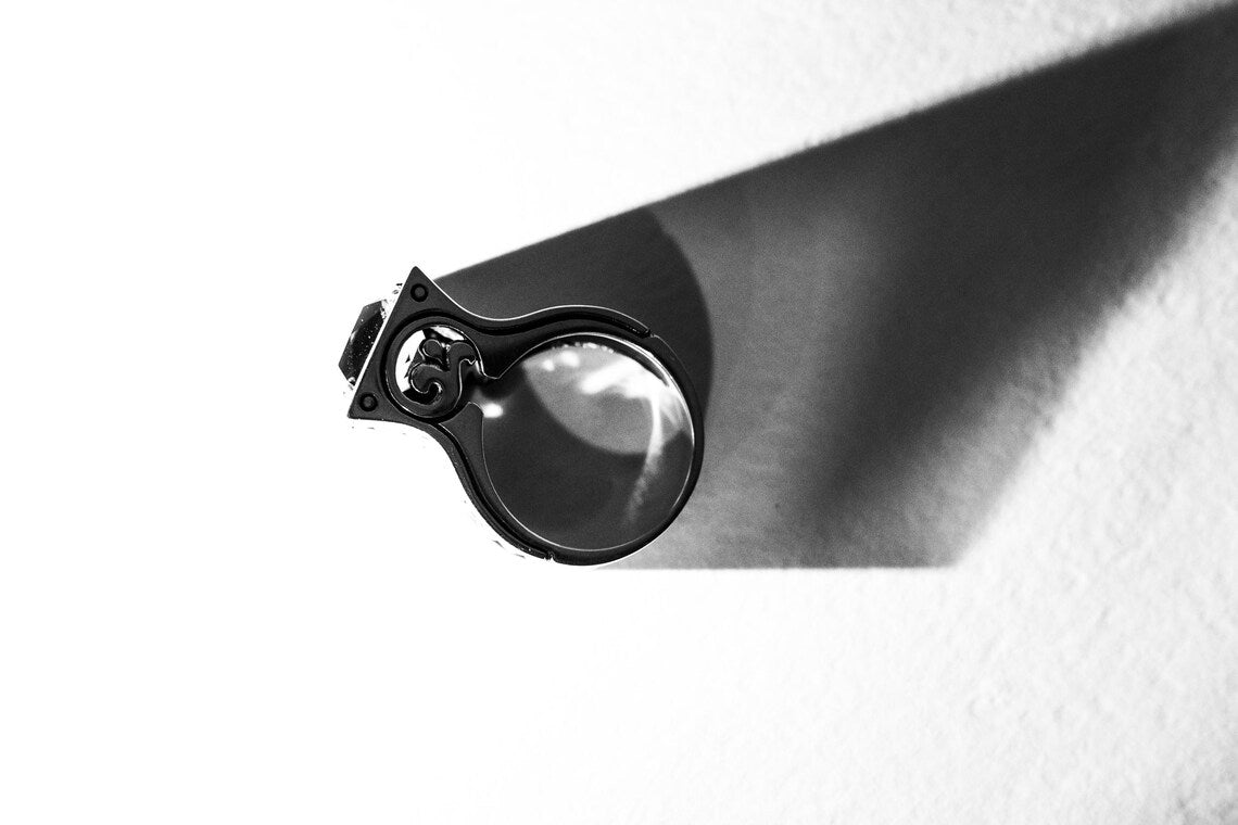 Vintage inspired crane ring with emerald centerpiece