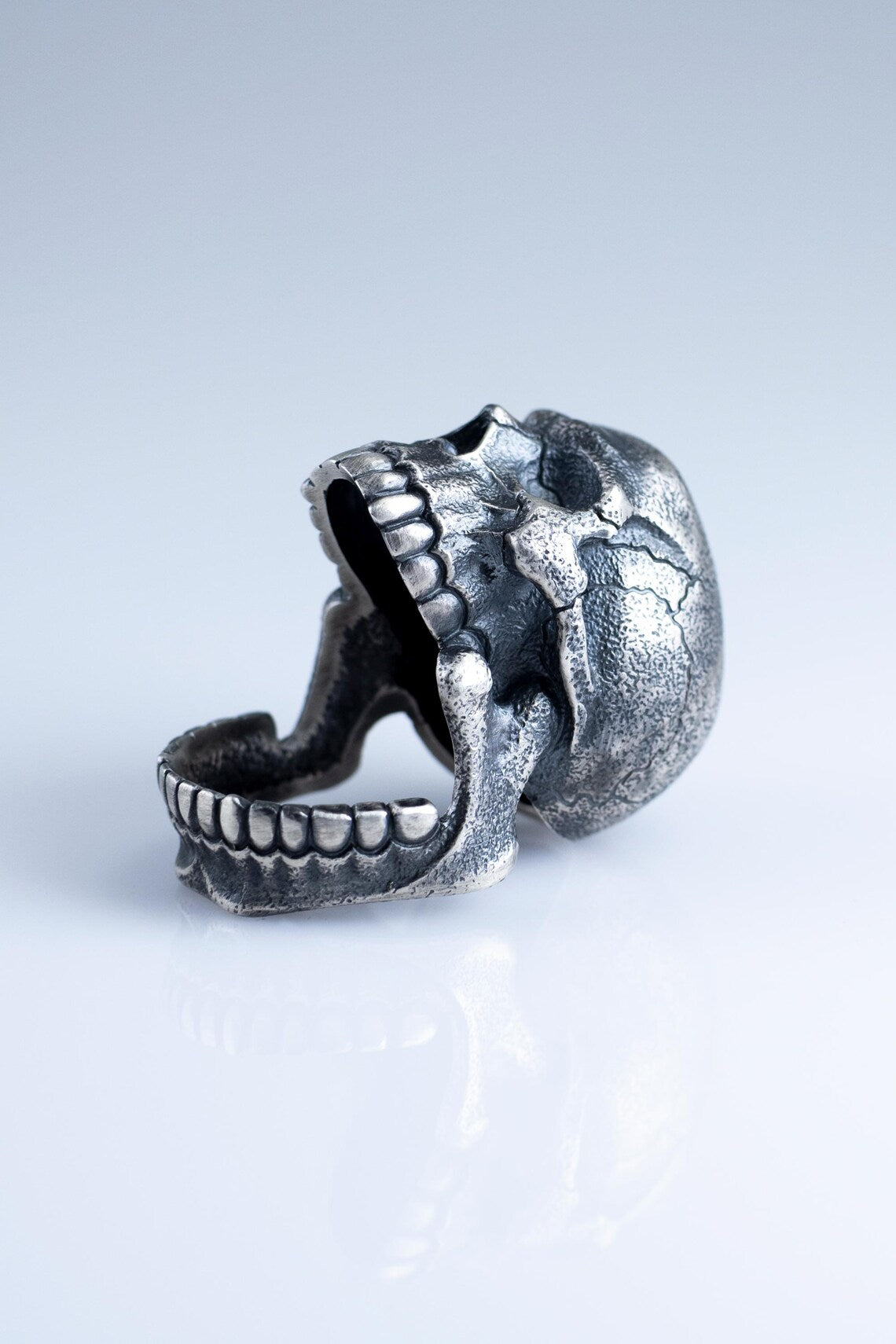 Detailed skull statement ring with Black Onyx gemstone and oxidized finish