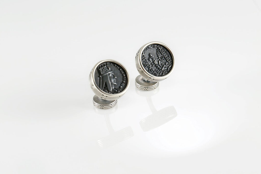Leopard cufflinks with green enamel eyes