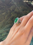 Elegant statement ring with filigree silver design and gemstones