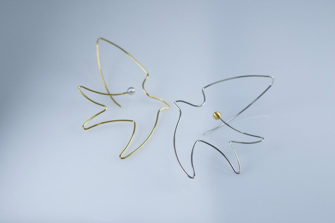 Minimalist bird dangle earrings in silver