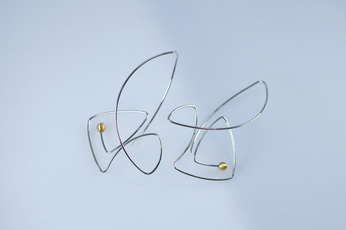Ocean inspired fish earrings close-up