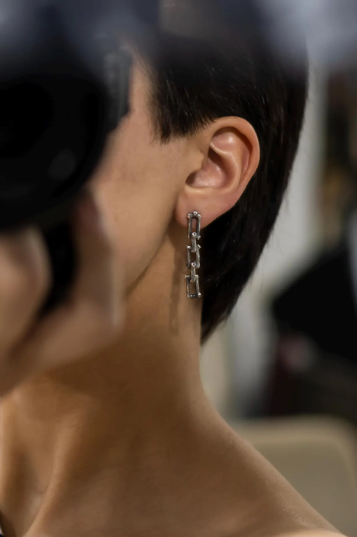 Sterling silver chain link earrings side view
