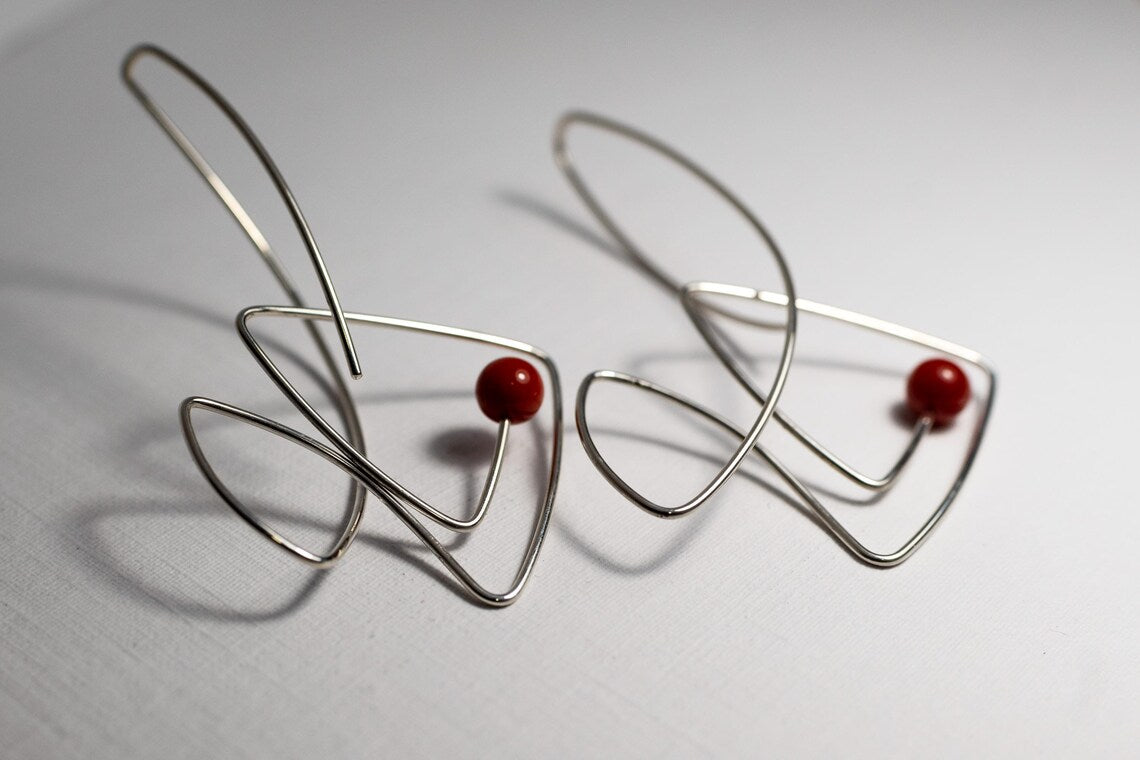 Ocean-inspired sterling silver statement earrings with pearls
