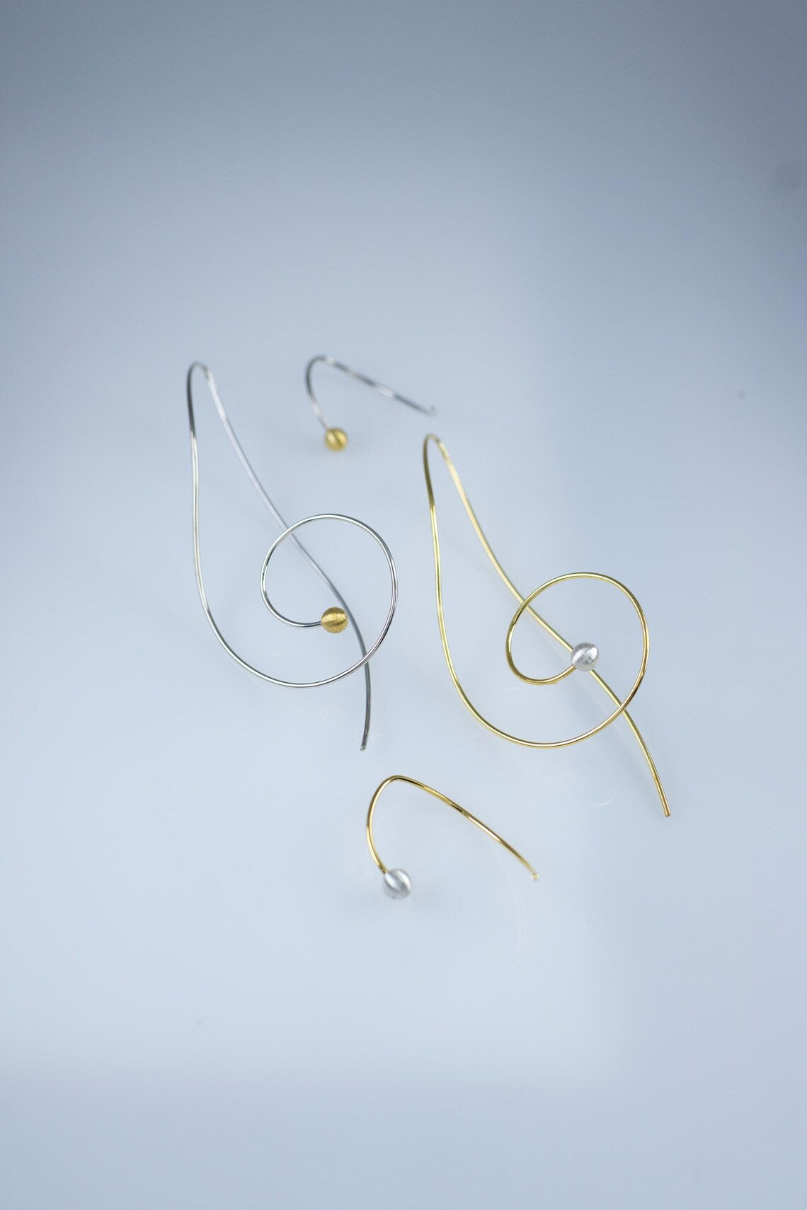 Handcrafted sterling silver treble and bass clef pearl earrings