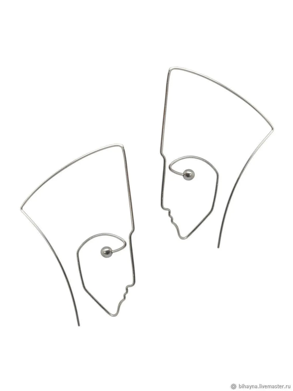 Artistic sterling silver statement earrings with abstract face design