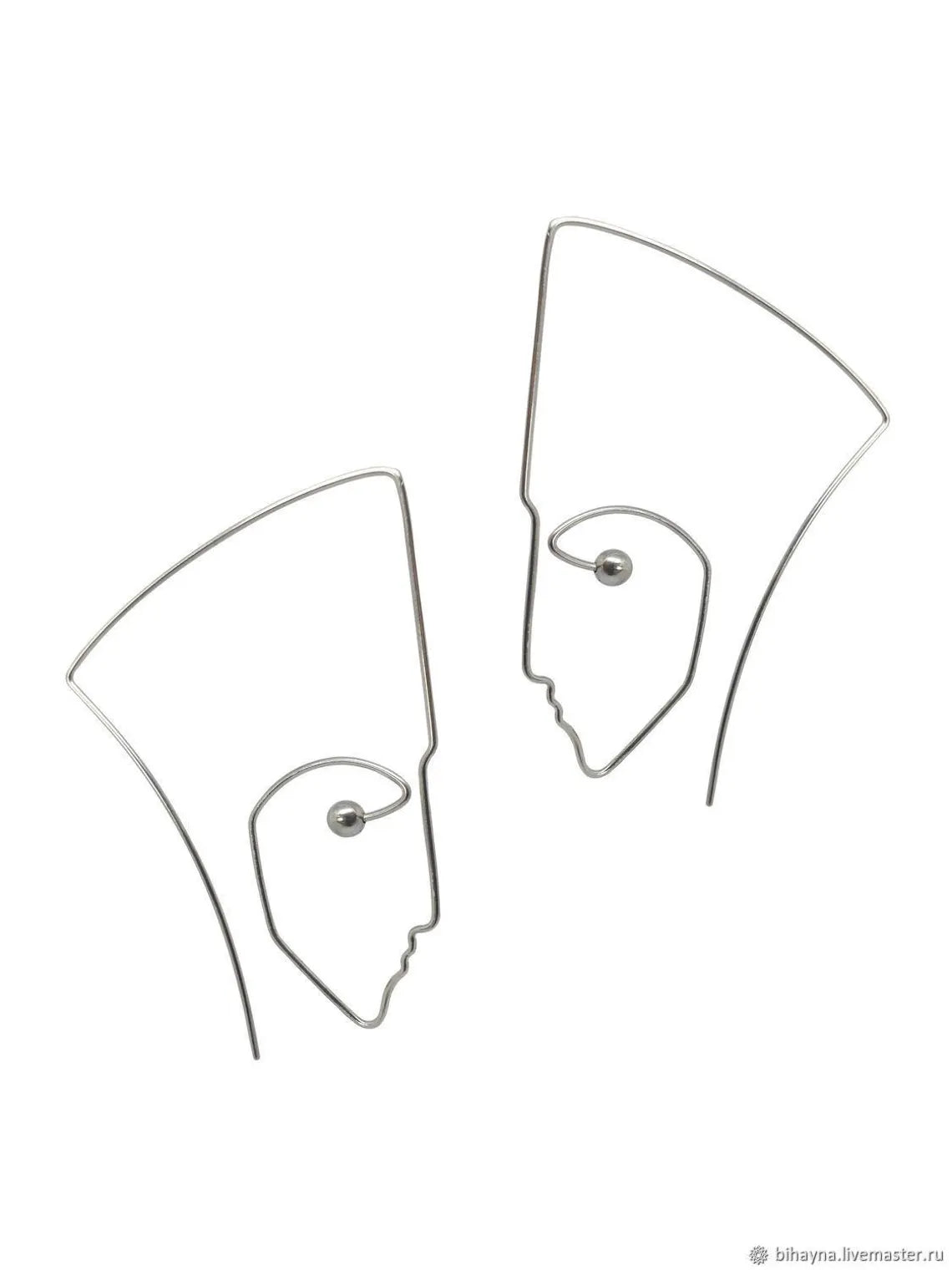 Artistic sterling silver statement earrings with abstract face design