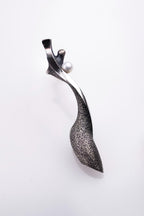 Handmade silver statement earrings with pearls and artistic curves