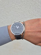 Modern designer silver wristwatch with clean dial and sapphire crystal